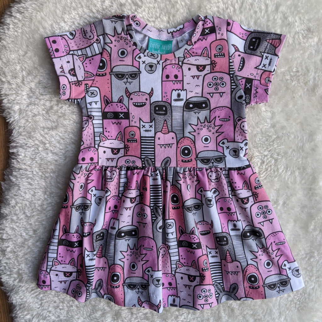 Size 1 pink monsters gathered waist dress
